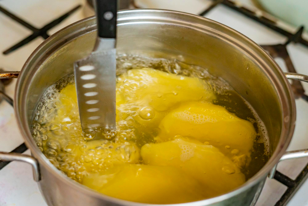 Pan With Boiling Potato Kitchen B (1)