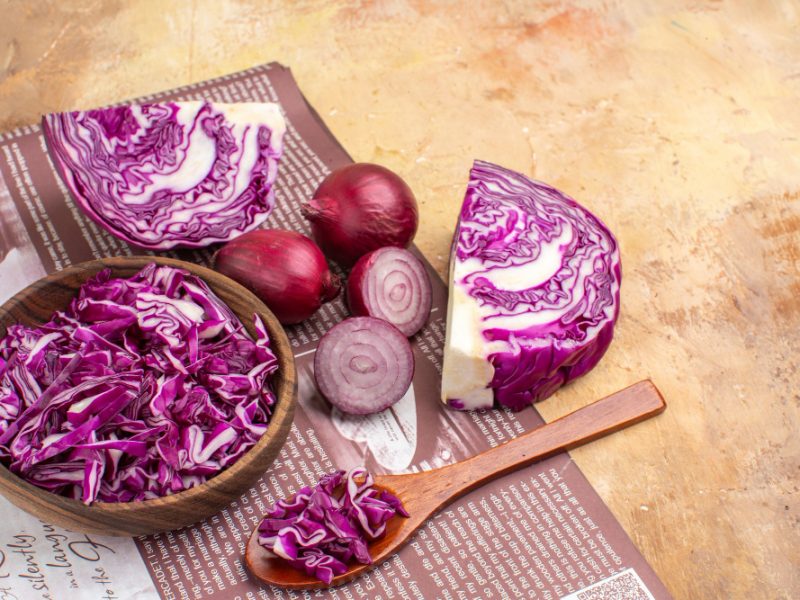 Top View Fresh Red Onions Bowl Chopped Red Cabbage Vegetable Salad Wooden Background With Copy Place