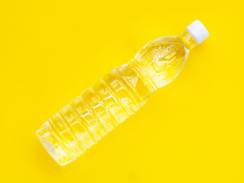 White Vinegar Bottle Yellow Background