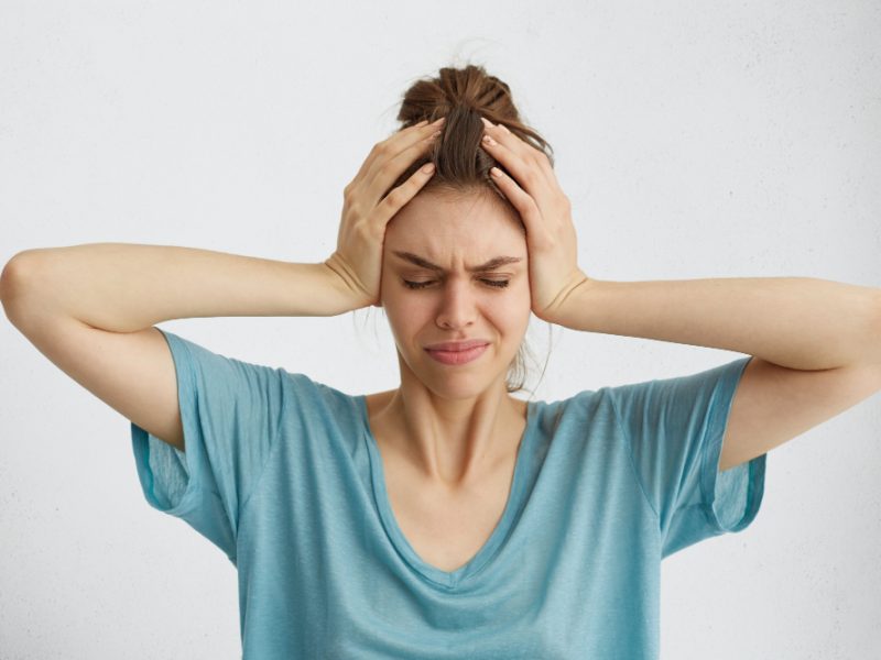 Worried Woman Closing Her Eyes With Hands Head Having Headache