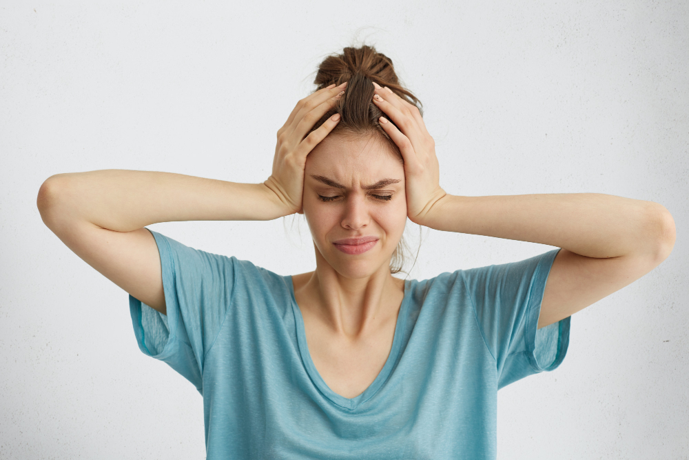 Worried Woman Closing Her Eyes With Hands Head Having Headache