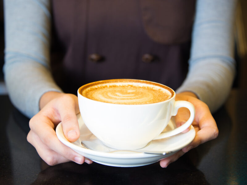 Close Up Female Hands Holding Coffee Cup
