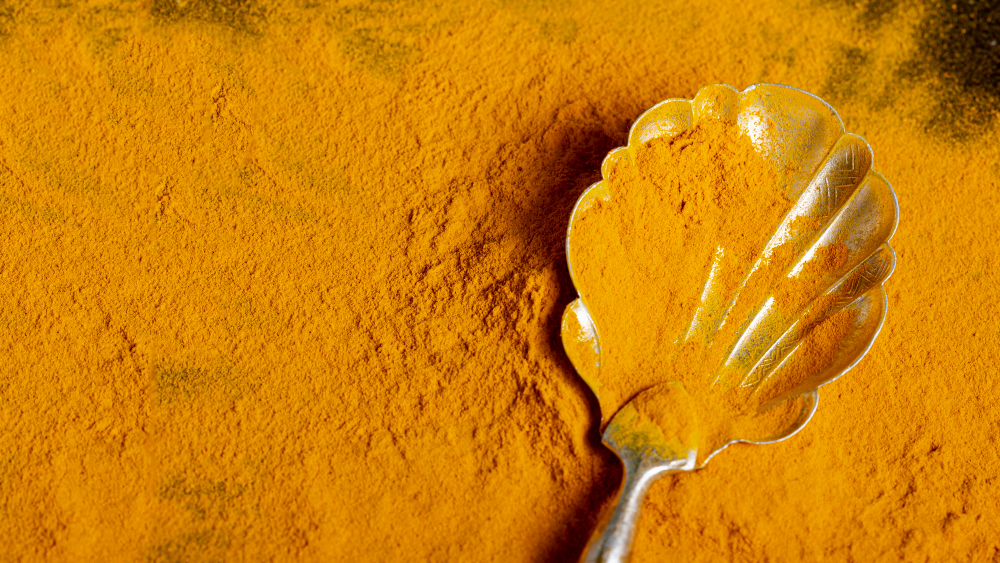 Top View Spoon With Turmeric With Copy Space