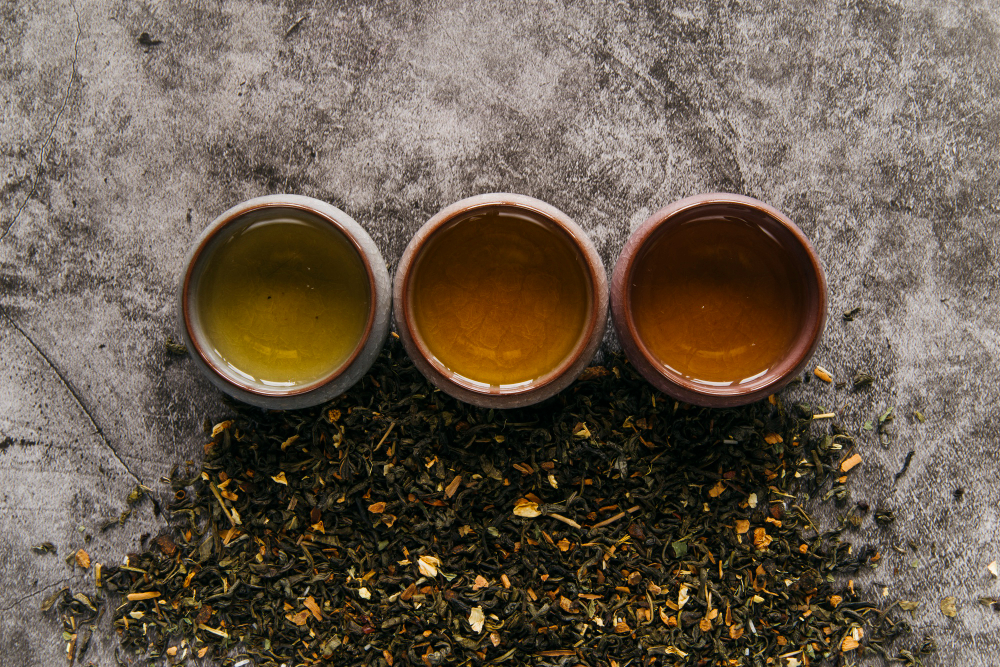 Herbal Chinese Teacup With Dried Tea Herb Concrete Backdrop