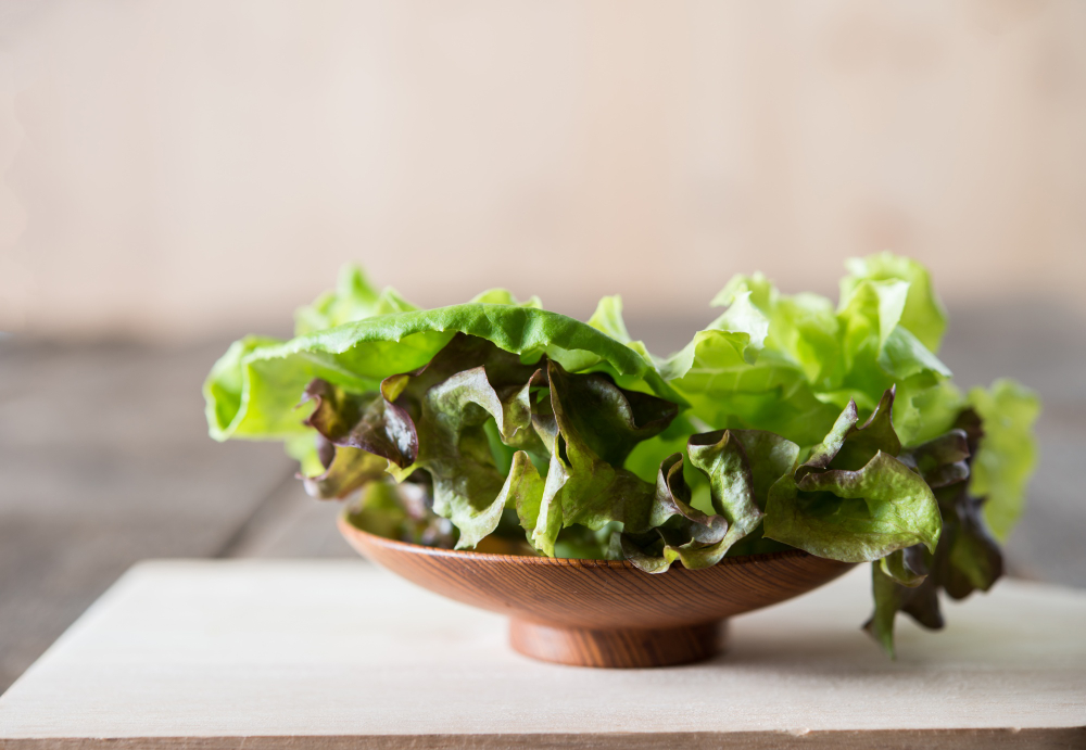 fresh-green-lettuce-salad-wooden-dish