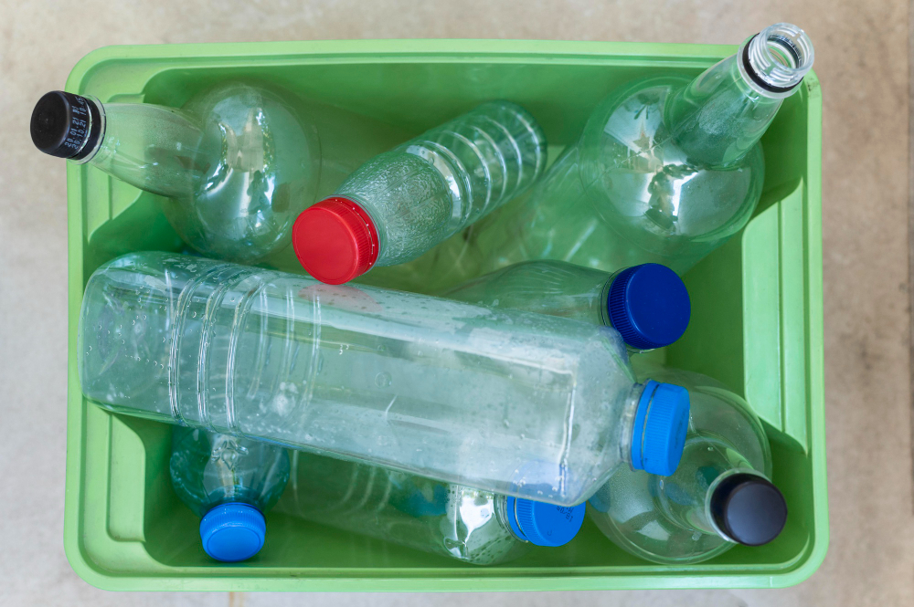 top-view-plastic-bottles-arrangement