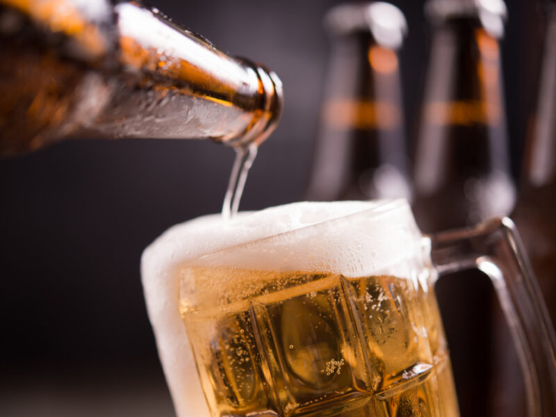 Glass Bottles Beer With Glass Ice Dark Background