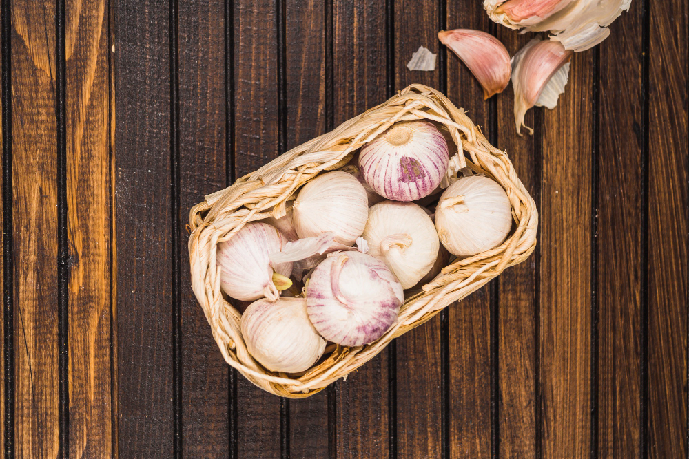 High Angle View Onions Basket Near Garlic Cloves Wooden Background
