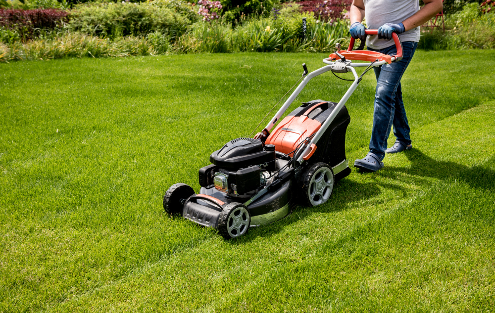 gardener-mowing-lawn