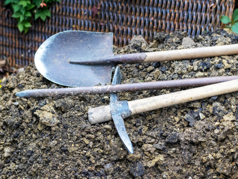 shovel-pickaxe-scrap-pile-earth-trench-digging-tools