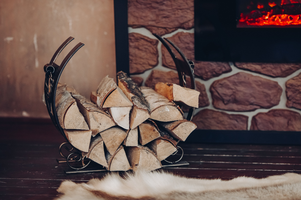 Decorative Metallic Holder With Heap Wooden Logs Stony Fireplace With Burning Logs