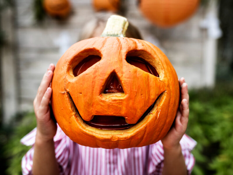 Young Playful Girl Enjoying Halloween