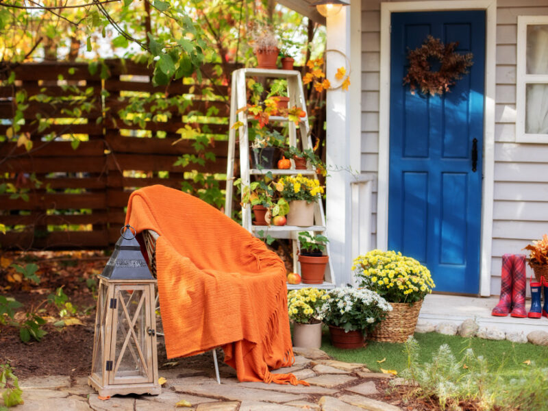 Cozy Patio With Chair Plaid Wooden Lantern Potted Chrysanthemums Stylish Fall Decor Front Porch Home Relax