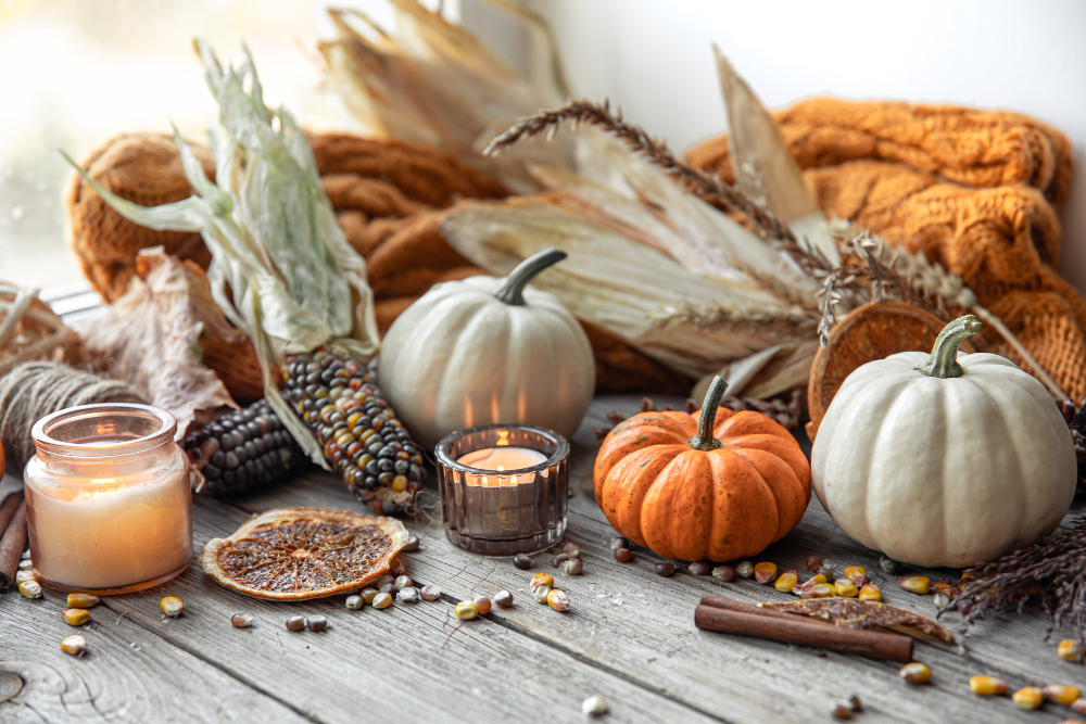 Cozy Autumnal Composition With Candles Pumpkins Corn Wooden Surface Rustic Style