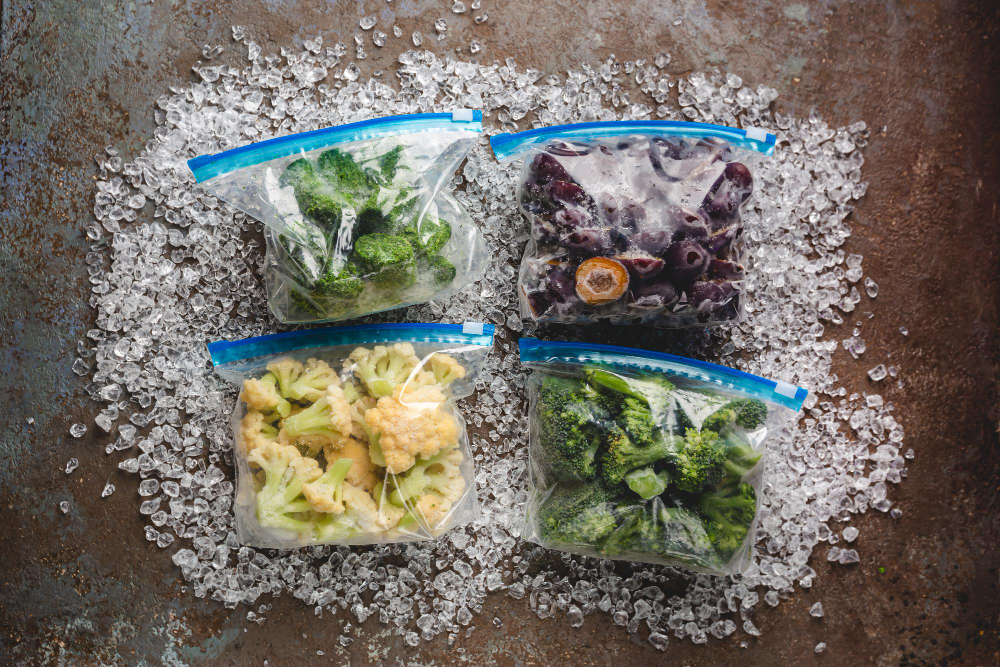 Mixed Frozen Various Vegetables Plastic Bags With Ice Top View