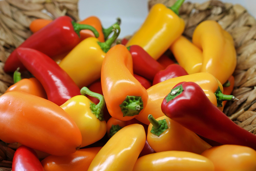 Shallow Focus Photography Yellow Red Bell Peppers