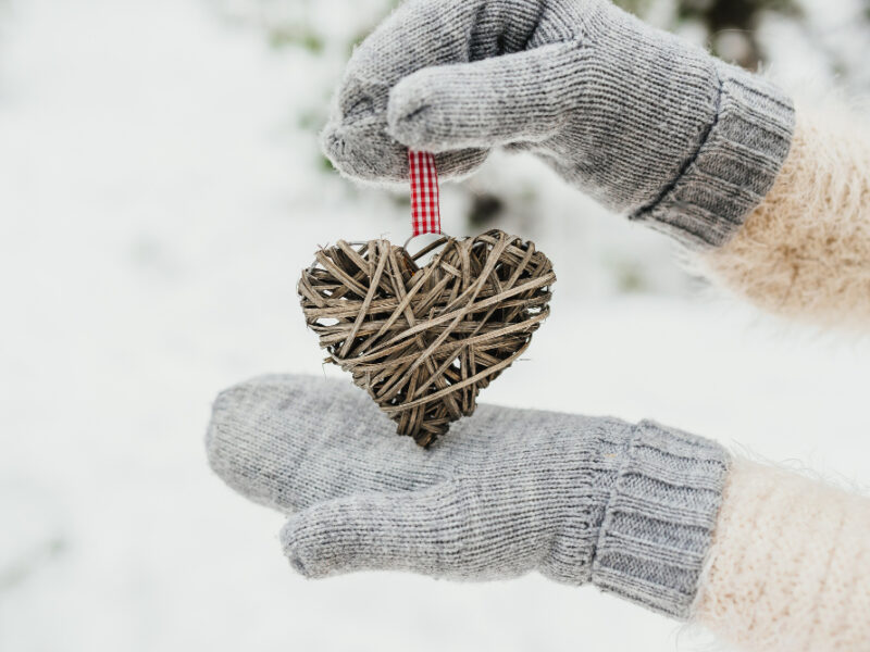 Female Hands Knitted Mittens With Entwined Vintage Romantic Heart