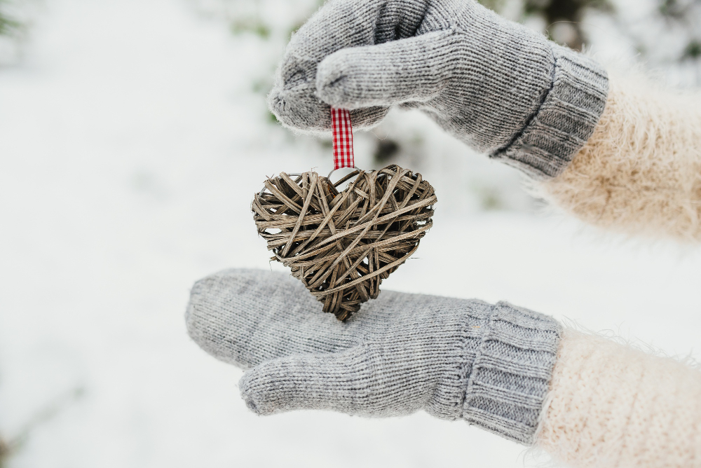 Female Hands Knitted Mittens With Entwined Vintage Romantic Heart