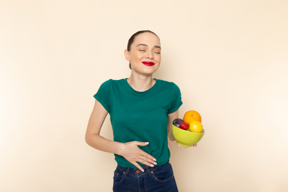 Front View Young Attractive Female Dark Green Shirt Holding Plate With Fruits With Smile