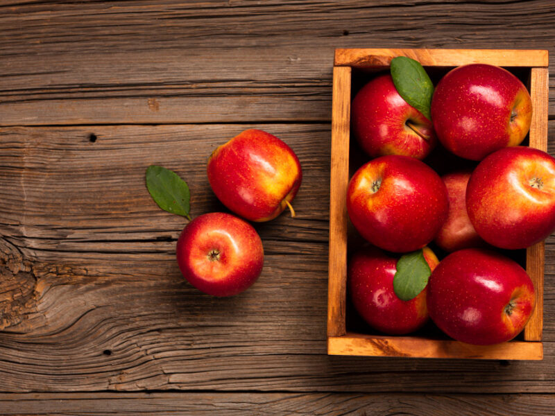 Flat Lay Crate With Ripe Apples With Copy Space