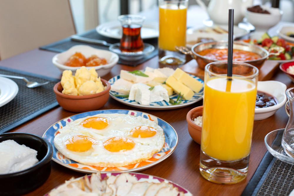 Front View Breakfast Table With Eggs Buns Cheese Fresh Juice Restaurant During Daytime Food Meal Breakfast