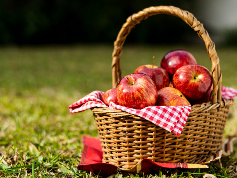 Delicious Red Apples Straw Basket