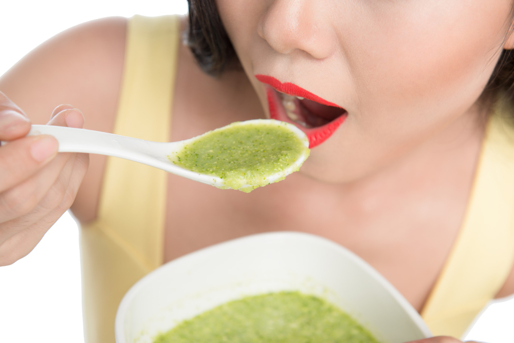 Portrait Asian Woman Eating Holding Plate Green Vegetables Soup