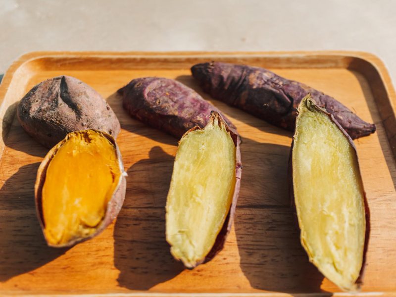 Sweet Potato Cut Into Half Wooden Plate