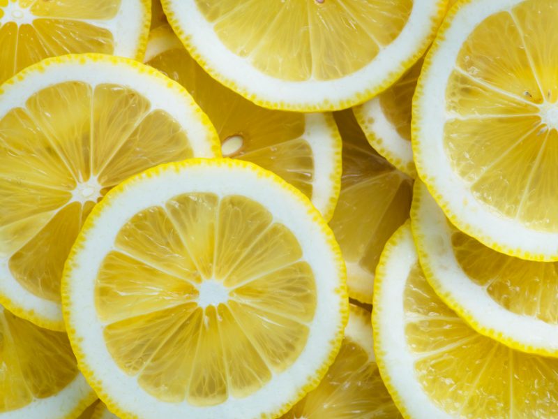 Closeup Slices Lemon Textured Background
