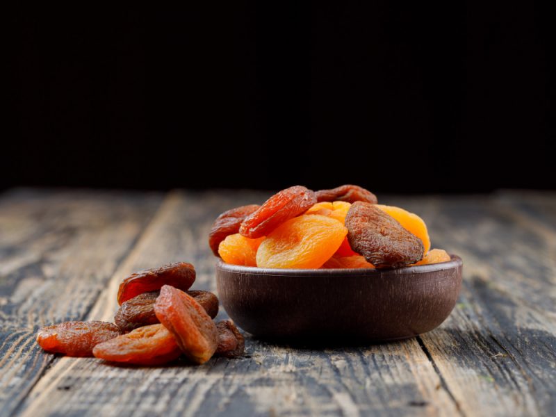 Dried Apricots Clay Bowl Wooden Table