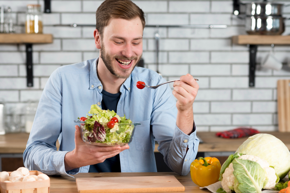 Portrait Happy Man Eating Fresh Salad Kitchen